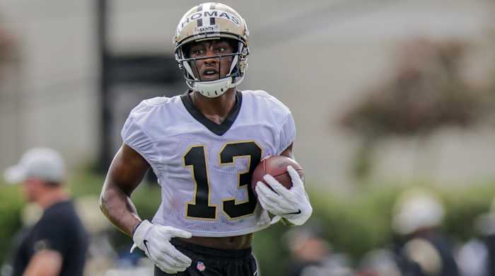 Saints wide receiver Michael Thomas (13) runs during training camp practice.